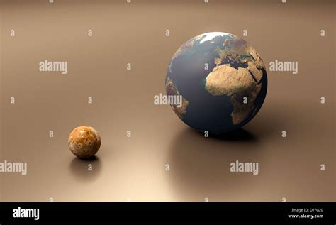 A rendered size comparison of the Jupiter Moon Io and Planet Earth Stock Photo: 56275576 - Alamy