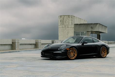 Royal Look of Black Porsche 911 on Matte Gold ADV1 Wheels — CARiD.com Gallery