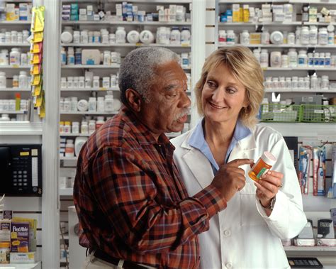 File:Man consults with pharmacist (1).jpg - Wikimedia Commons