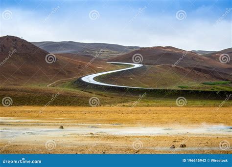 Zig Zag Road in a Landscape with Hills Stock Photo - Image of grass ...