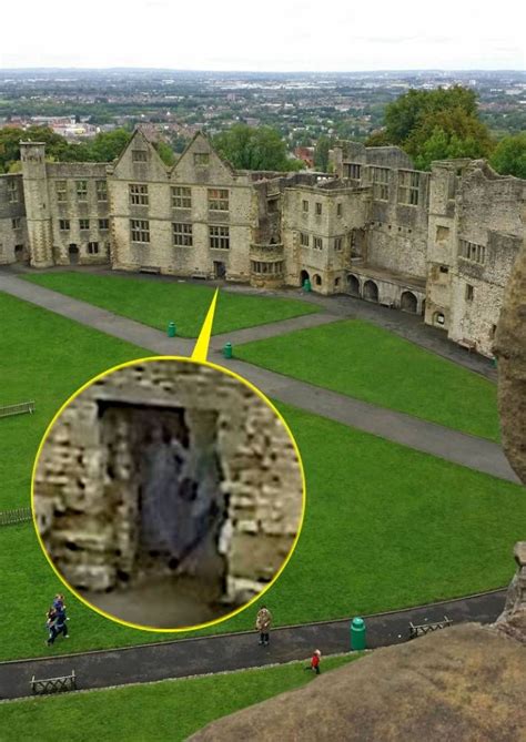 A woman says she is now ‘a believer’ after spotting a ghostly figure in a photograph taken at ...