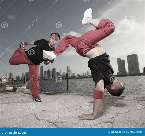 Pair of Guys Performing Acrobatic Stunts Stock Photo - Image of pair, outdoors: 10643538