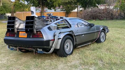 Delorean Time Machine Replica signed by "Doc Brown" Christopher Lloyd for sale - DeLorean Time ...