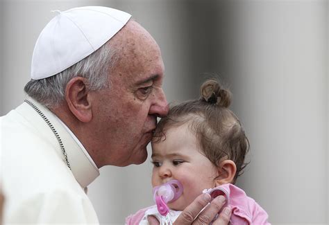 Pope Francis kisses child during general audience | The Catholic Sun