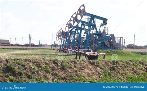 Oil and Gas Industry. Oil Pumps Pump Oil in the Field Stock Footage ...