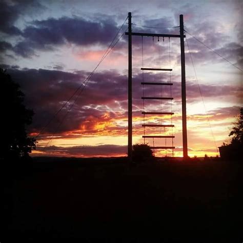 The sunset behind Jacob's Ladder at PGL Boreatton Park adventure centre ...