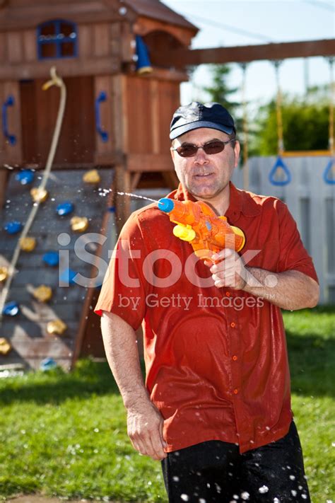 Water Gun Fight Stock Photo | Royalty-Free | FreeImages