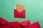 Photo of Opened red festive Christmas envelope | Free christmas images