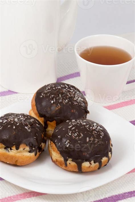 Donuts and coffee 760093 Stock Photo at Vecteezy