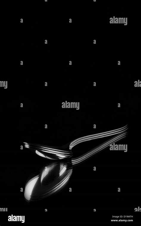 Spoon position Black and White Stock Photos & Images - Alamy