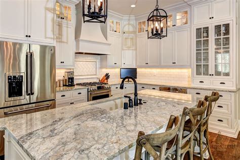 Beautiful balance. | Granite countertops kitchen, Ivory kitchen cabinets, Grey granite countertops