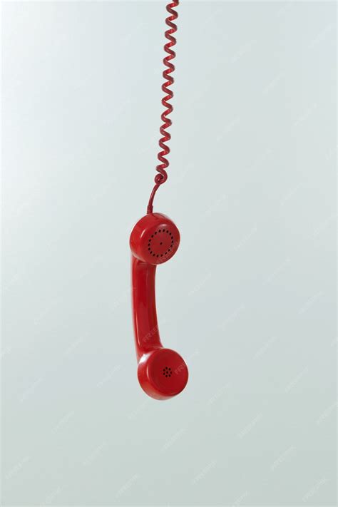 Premium Photo | Vintage telephone hanging.