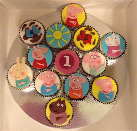 cupcakes with peppa the pig characters on them are arranged in a circle
