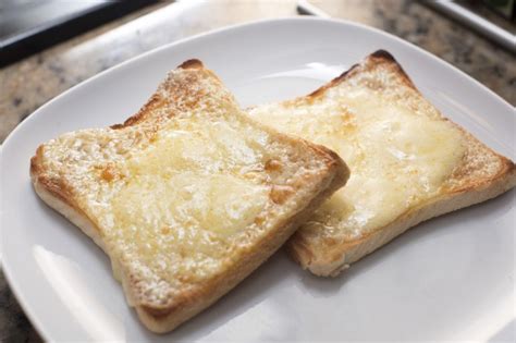 Toasted bread with melted cheese - Free Stock Image