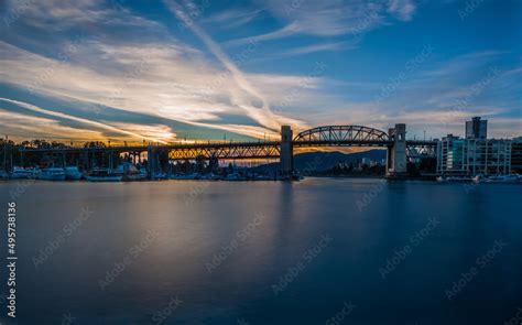 Beautiful sunset shining over the Burrard Street Bridge in Vancouver ...