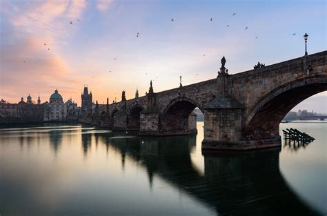 Charles Bridge - Charles Bridge and the Vltava river in a freezing winter sunrise. Prague, Czech ...