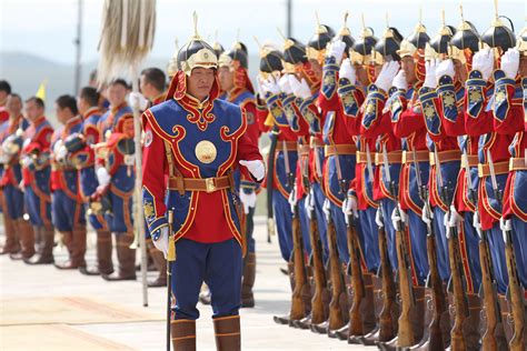 Members of the Mongolian Armed Forces 234 Cavalry Unit prepare to give a demonstration during ...