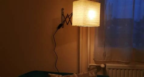 Ikea FRACK Hack: Wall-Mounted Reading Lamp Emits Soft, Warm Light