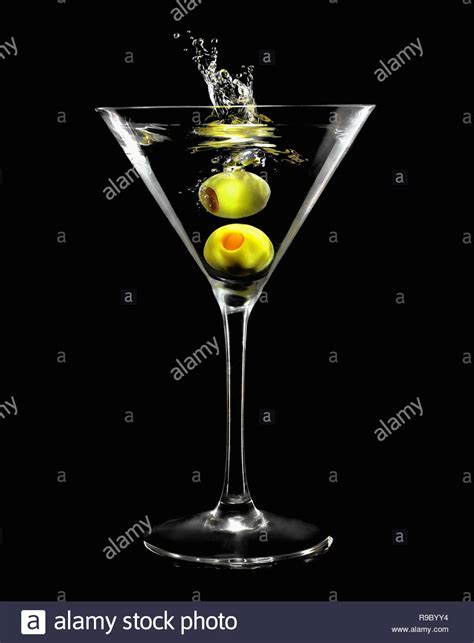 Martini with green olive hi-res stock photography and images - Alamy