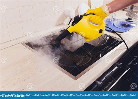 Cleaning Kitchen Hob with a Steam Cleaner. Stock Photo - Image of house ...