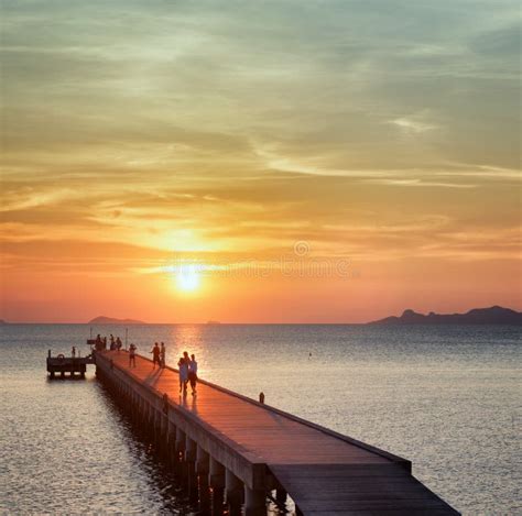 Boat pier at sunset stock photo. Image of holiday, sand - 30418194