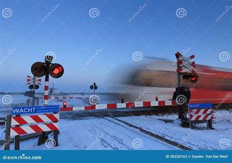 Winter railroad crossing stock image. Image of netherlands - 36520163