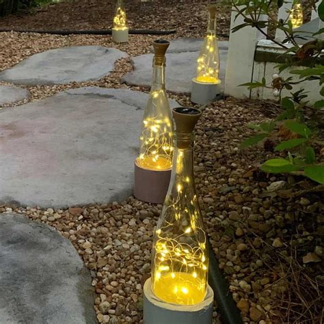 DIY Wine Bottle Lights With Pretty Cement Bases | Artsy Pretty Plants