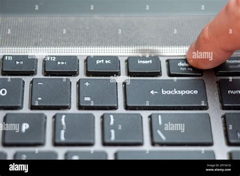 Delete button pressing a lot of times on keyboard, laptop keyboard close up Stock Photo - Alamy