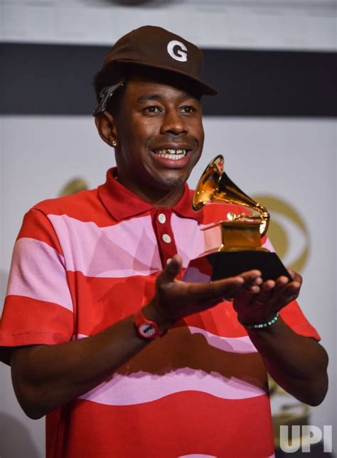 Photo: Tyler, the Creator wins award at the 62nd annual Grammy Awards in Los Angeles ...