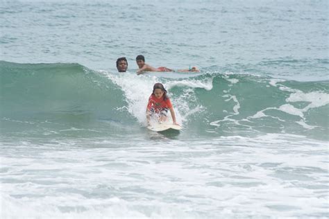 Surfing on the beach 2 » Planet Conservation