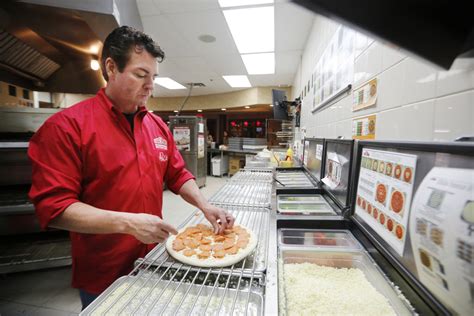 Papa John's new tack to challenge Pizza Hut, Domino's | wtsp.com