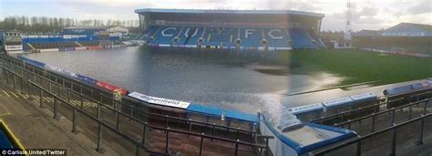 Carlisle United's Brunton Park stadium left submerged following heavy rain in Cumbria | Daily ...