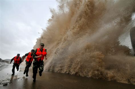 Typhoon Fitow hits China after evacuation of 574,000 people - Images ...