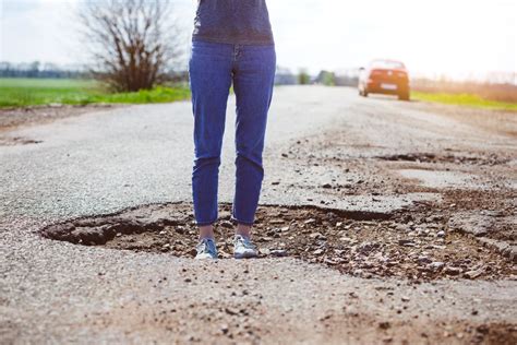 Why you Should Avoid Potholes on the Road - Advanced Transmissions & Emissions