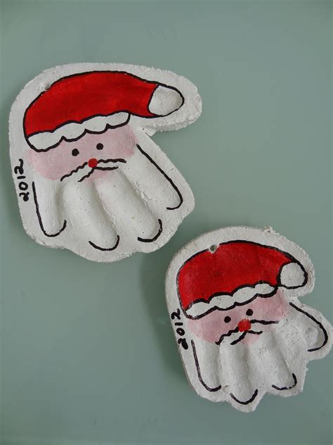 Christmas Craft: Salt Dough Santa Handprints | Handprint christmas, Santa handprint, Kids christmas