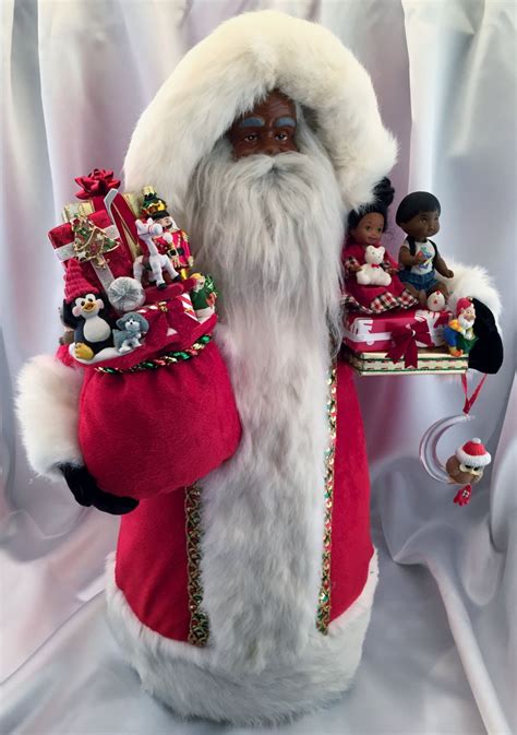 a man dressed as santa clause holding a tray with christmas decorations ...