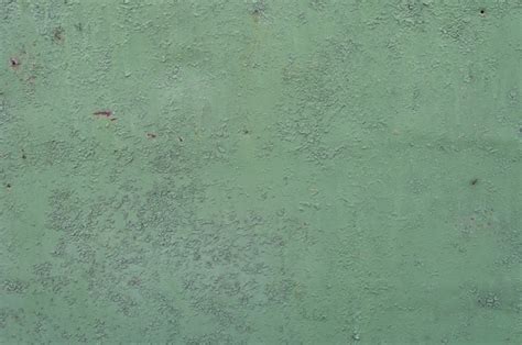 Premium Photo | Green metal background. poured paint. metal texture can be used as background