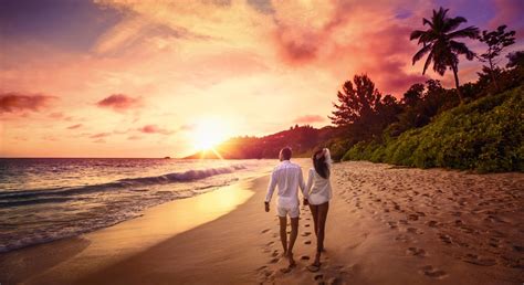 Young Happy Lovers on Beach. Couple Walking on Romantic Travel H | Two ...