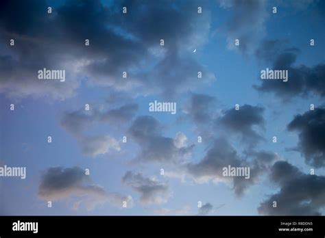 Crescent Moon and clouds Stock Photo - Alamy