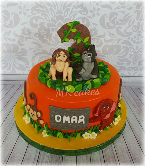 Tarzan cake | Jungle birthday party, Jungle theme birthday, Jungle safari birthday