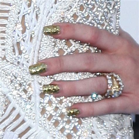 Miley Cyrus Gold Nails