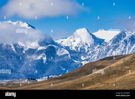 The Absaroka Mountains, snow-capped in spring, viewed from Interstate 90 in Montana, USA Stock ...