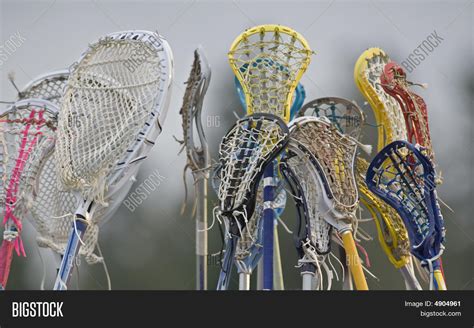 Girls Lacrosse Sticks Image & Photo (Free Trial) | Bigstock