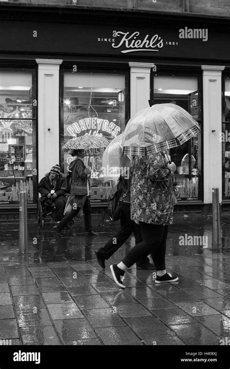 Street Photography, Umbrellas in the Rain Stock Photo - Alamy