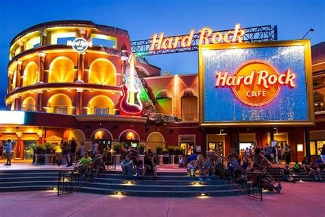 The exterior of Hard Rock Cafe with its illuminated sign at Universal CityWalk. | Universal ...
