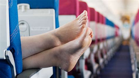 Ex-flight attendant explains why you should never take your shoes off ...