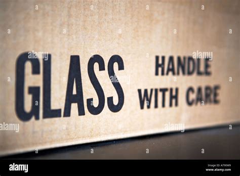 GLASS, HANDLE WITH CARE SIGN Stock Photo - Alamy