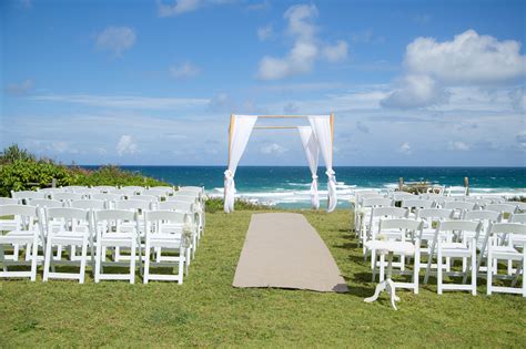 Beach wedding ceremony - 4 posted bamboo archway with beach chairs | Wedding beach ceremony ...