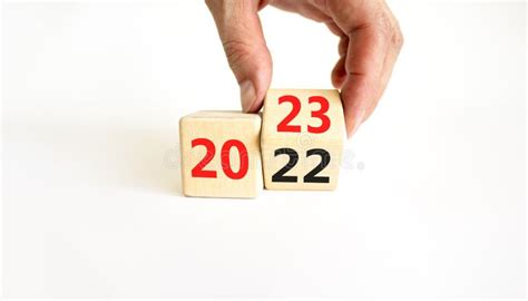 2023 Happy New Year Symbol. Businessman Turns Cubes, Symbolize the ...