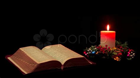 Open Bible With Candle